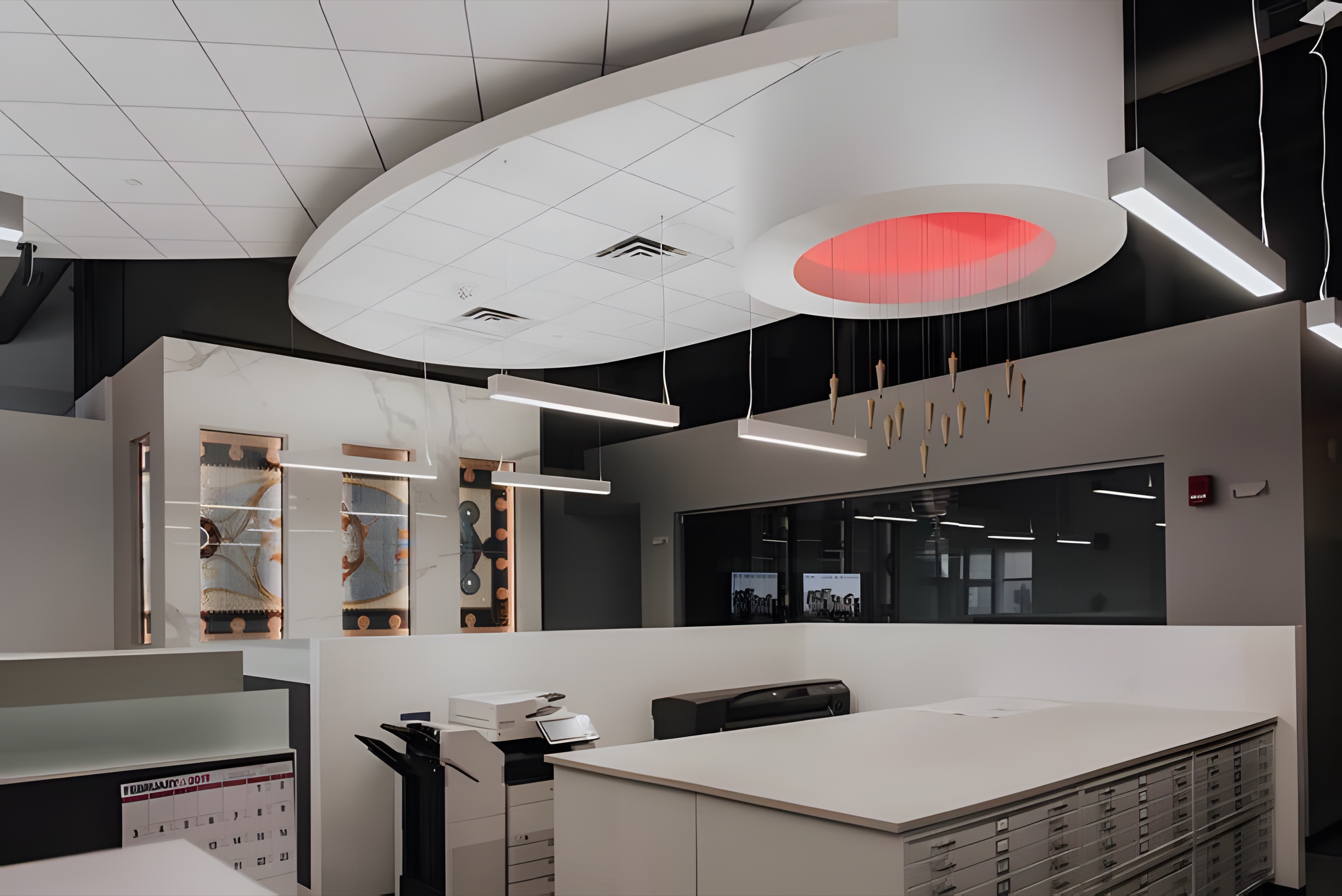 An office with sculpted ceiling coves and a red light ring